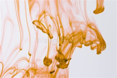 Yellow liquid in water stock photo. Image of chemical - 53140852