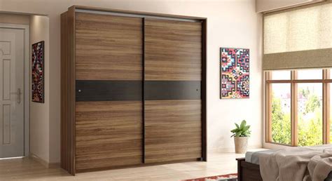 Avalon Engineered Wood Sliding Door Wardrobe in Chocolate Oak And Silver Grey Finish - Urban Ladder