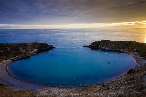 A picture of sunset and the stunning Lulworth Cove on the Jurassic Coast in Dorset – Rick McEvoy ...