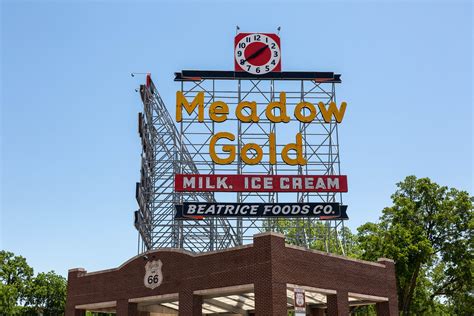 Meadow Gold | Vintage sign and clock perserved on historic H… | Flickr