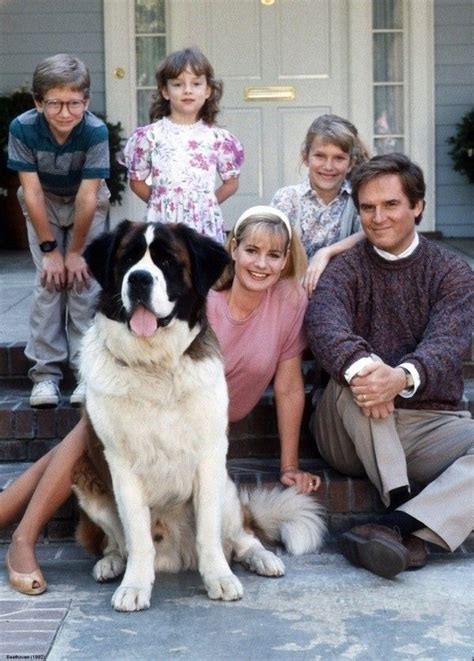 Beethoven, played by dog actor Chris with his on set family the Newtons ...