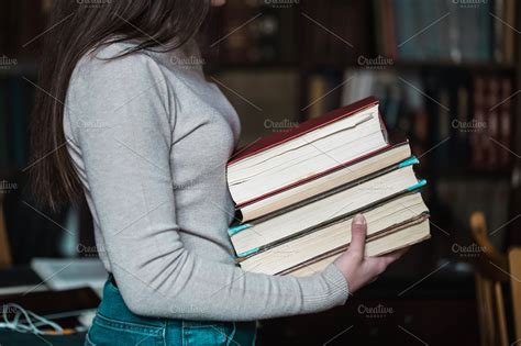 Student Girl Holding Books | High-Quality Education Stock Photos ...