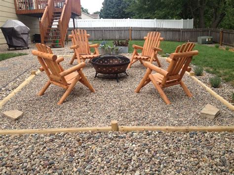 Pea Gravel Fire Pit with Landscape Timbers and Cedar Log Adirondack Chairs