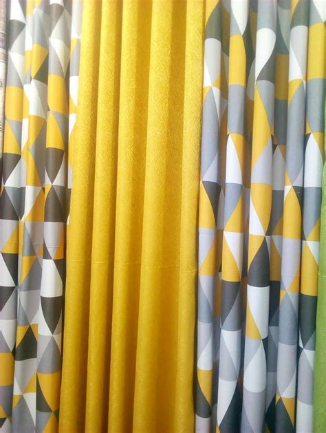 the curtains are all different colors and shapes