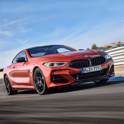 The new BMW M850i xDrive Coupe in colour Sunset Orange and 20" M light ...