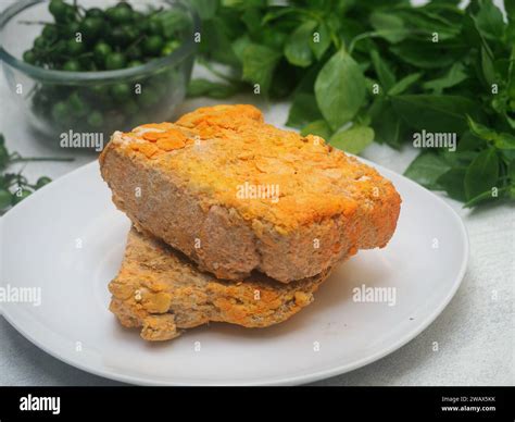 Raw Oncom, Indonesian traditional food, made from fermentation soybean Stock Photo - Alamy