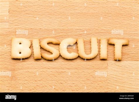 Word biscuit over the wooden background Stock Photo - Alamy