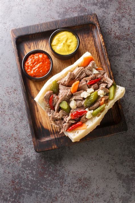 Chicago Italian Beef Sandwich is Composed of Thin Slices of Seasoned Roast Beef, Simmered and ...