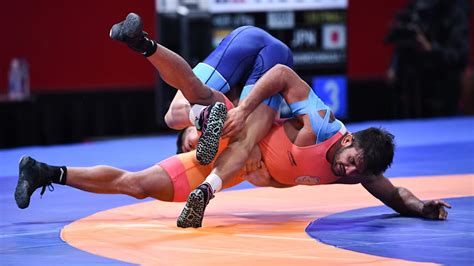 Indian wrestling team for Olympic qualifiers grounded after travel ban