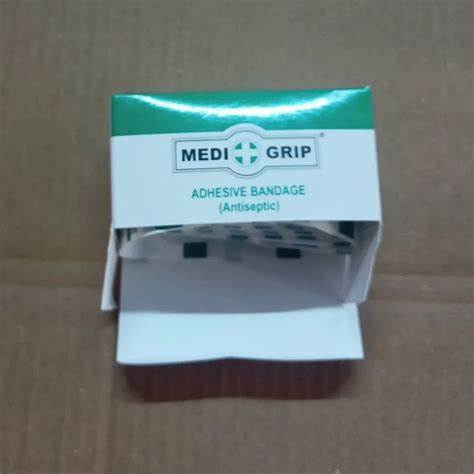 White Short Stretch Compression Medigrip Adhesive Bandages, Regular ...