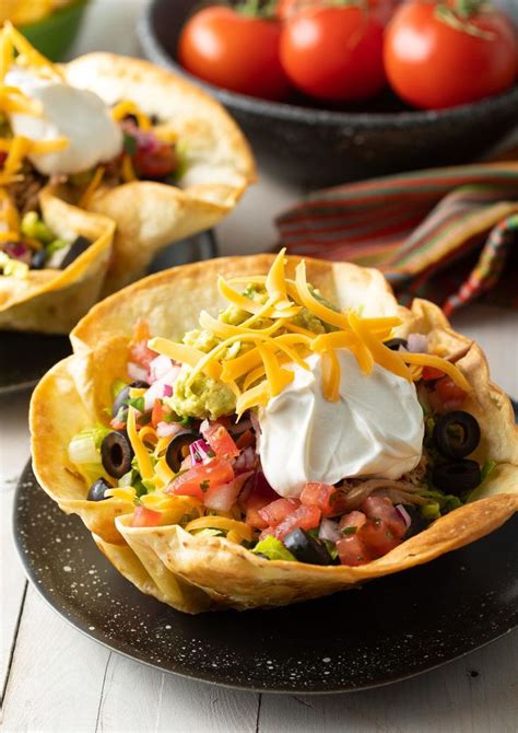 Make Amazing Taco Salad Recipes at home with these ultra-crispy Bubbly Taco Salad Bowls! Learn ...