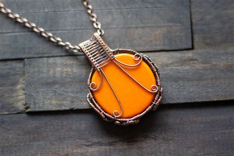 Copper Wire Wrapped Pendant with Steampunk Man on Orange Fused Glass | Wire wrapped pendant ...