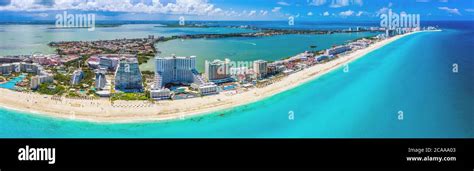 Aerial panoramic view of the Hotel Zone (Zona Hotelera) and the beautiful beaches of Cancún ...