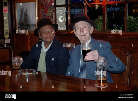 Older men in pub drinking Stock Photo: 7310374 - Alamy