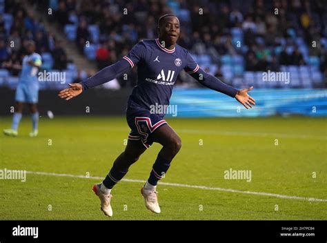 Paris Saint Germain's Djeidi Gassama celebrates scoring their side's first goal of the game ...