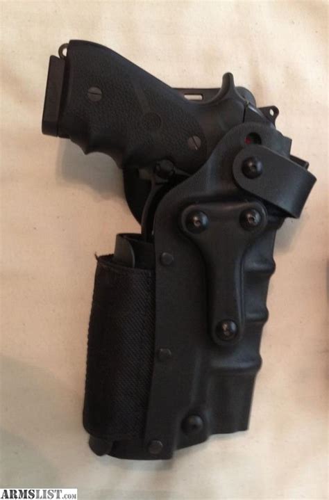 ARMSLIST - For Sale: Safariland tactical Holster for Beretta M9/92A1 (w/ light)