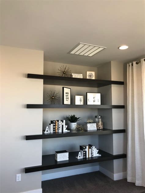 Shelving ideas | Black wall shelves, Living room decor apartment ...