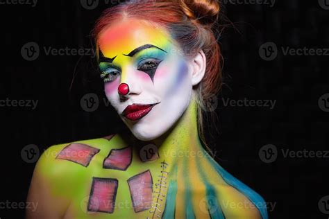 Nice young woman with a face painting clown 20088813 Stock Photo at ...