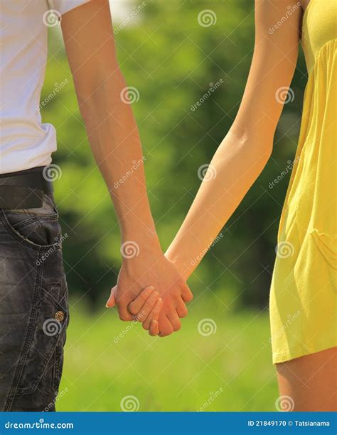 Boy And Girl Holding Hands Stock Photo - Image: 21849170