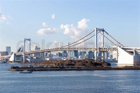 Tokyo Bay with Rainbow Bridge in Odaiba city skyline | Stock image | Colourbox