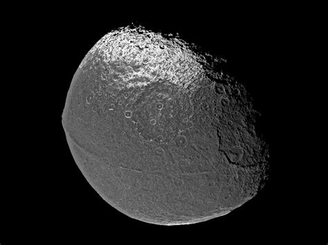 Iapetus's Ridge: The Result of Many Small Impacts? - Eos