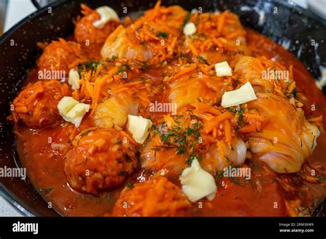 Traditional Ukrainian raw (unprepared) stuffed cabbage rolls with meat ...