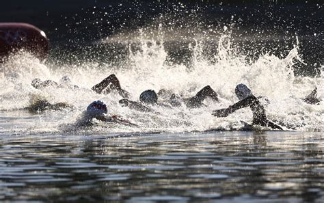 Olympics-Marathon Swimming-Elbows and fish: Swimmers navigate ordeals of open water at Tokyo ...