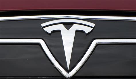 Logo Tesla - Signification et histoire du symbole de la voiture Tesla ...