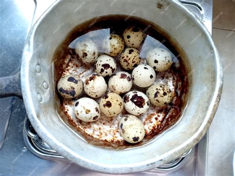 Premium Photo | Telur puyuh rebus or poached quail eggs on a plate ...