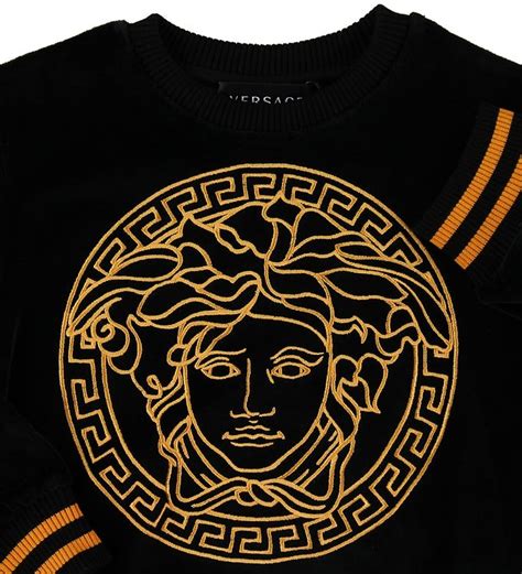 Gold Versace Logo