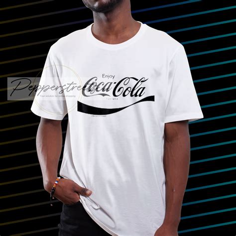 Coca-Cola Black Enjoy Logo T-Shirt This t-shirt is Made To Order,