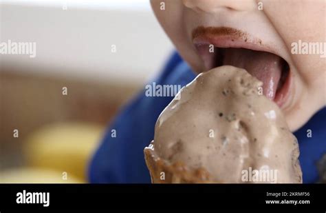 Boy ice cream cone Stock Videos & Footage - HD and 4K Video Clips - Alamy