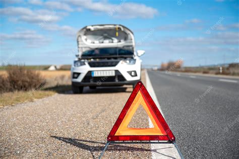 Premium Photo | Red emergency stop sign on the road