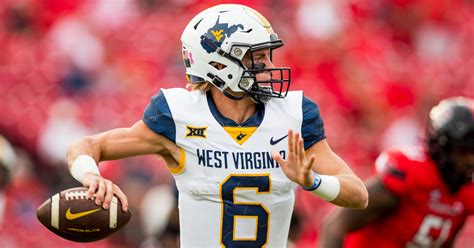 West Virginia QB Garrett Greene leaves game after hit to head, play reviewed for targeting - On3