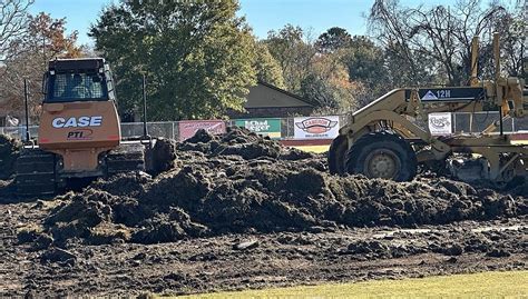 Crews Removing Sod on Football Field at Acadiana High School