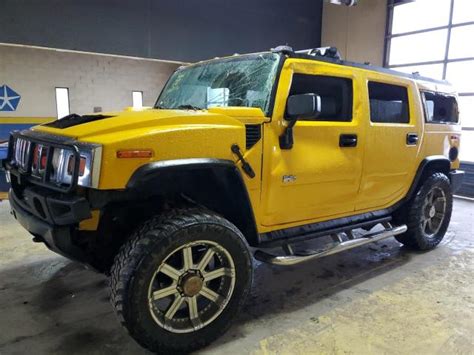 2003 HUMMER H2 YELLOW 5GRGN23U53H123789