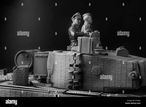 Monochrome image of crew on turret of Tiger 1 tank with Zimmerit anti ...