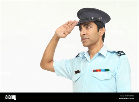 Indian pilot saluting Stock Photo - Alamy