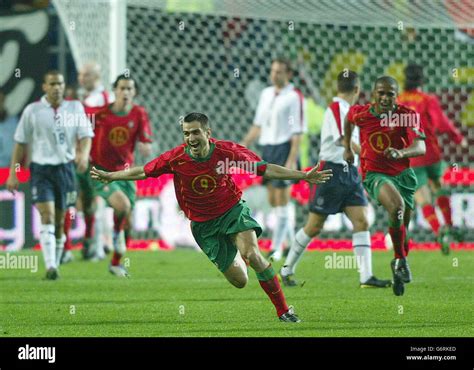 Portugals pauleta celebrates his goal hi-res stock photography and ...