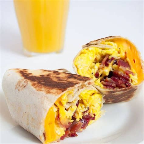 Bacon, Egg & Cheese Breakfast Wrap with Bacon, Eggs, Flour Tortilla, Cheddar Cheese. | Breakfast ...