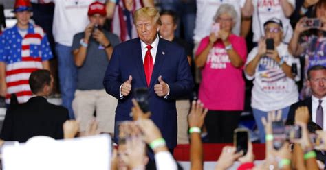 Rally in Ohio features one-finger salute, music similar to QAnon song