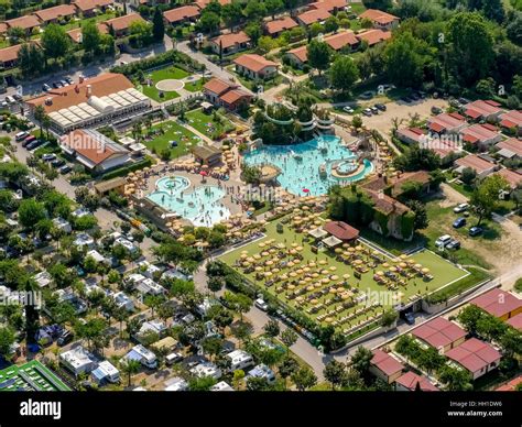 Aerial view of Piani di Clodia Camping, campsite, swimming pool and sun terrace with parasols ...