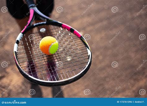 Close-up of Tennis Ball on Racket in Hands of Player. Stock Photo - Image of outdoor, hands ...