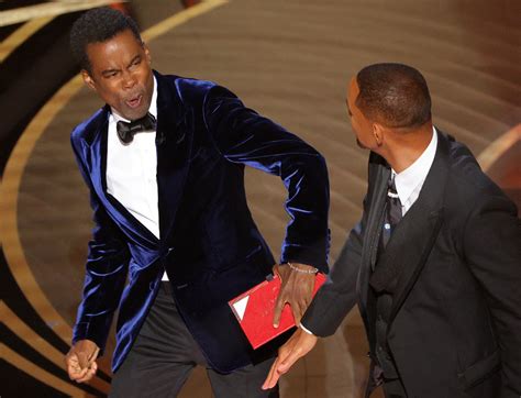 Will Smith smacks Chris Rock on stage, then wins an Oscar | Reuters