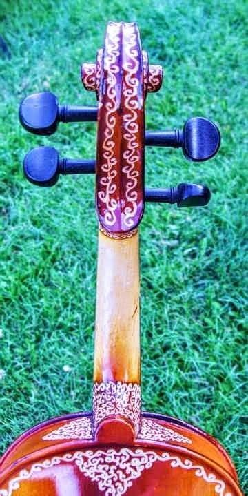 Custom carving on violin scroll | Violin scroll, Custom carved, Violin