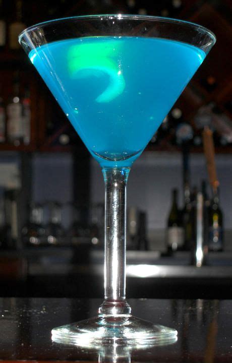 Blue Cocktail Drinks | Blue Moontini | MixnSip.com Blue Cocktails ...