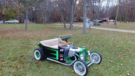 This is a T-Bucket i scratch built. Has a 3 spd trans axle and a 16.5 ...