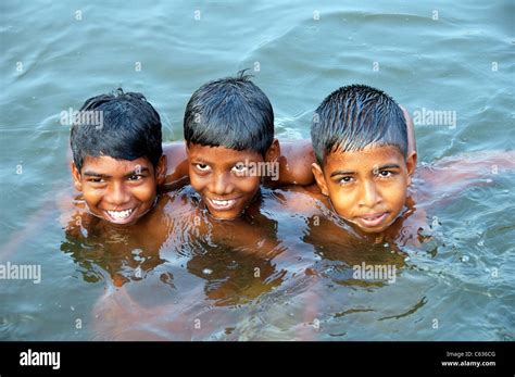 Indian boys swimming in river hi-res stock photography and images - Alamy