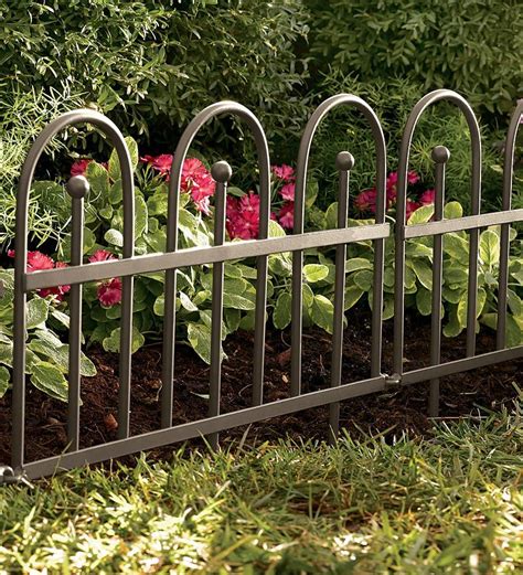 Our Garden District Iron Fence Wrought Iron Edging is a pretty and practical addition to your ...