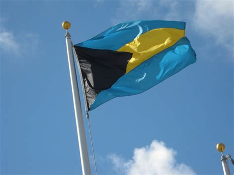 Bahamian Flag, first international flag raised at Miami City Hall - CNW Network